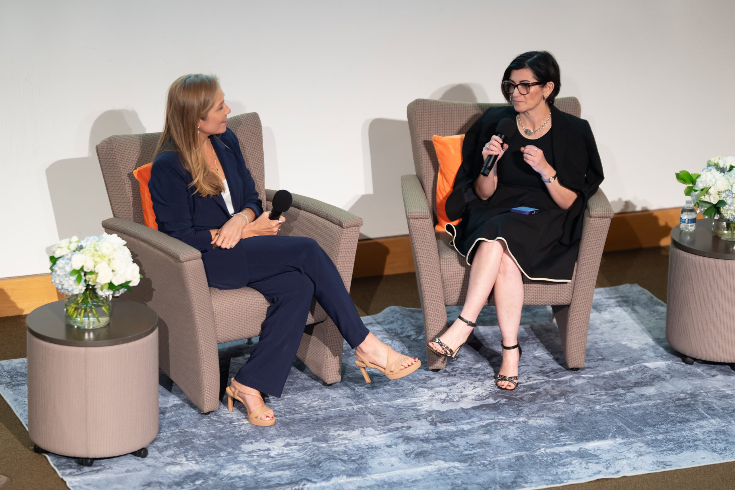 Two women in a discussion at Prosperity Now VITACon event in Minneapolis.